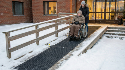 HOTStars™ Heated Passageway Mats installed on a snowy wheelchair ramp, ensuring safe access with anti-slip and snow-melting features.